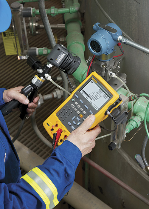 Image 2. A multifunction process calibrator and a portable pressure pump are critical when calibrating pump sensors.