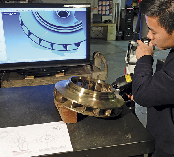 Image 2. An engineer verifies casting geometry to hydraulic design specifications.