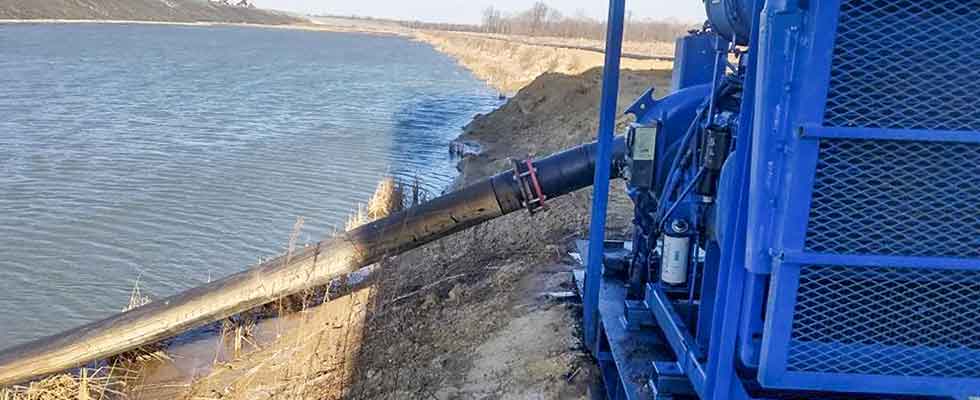 Several ponds and other materials were overlying the mineral deposit at a Midwestern mining site. 