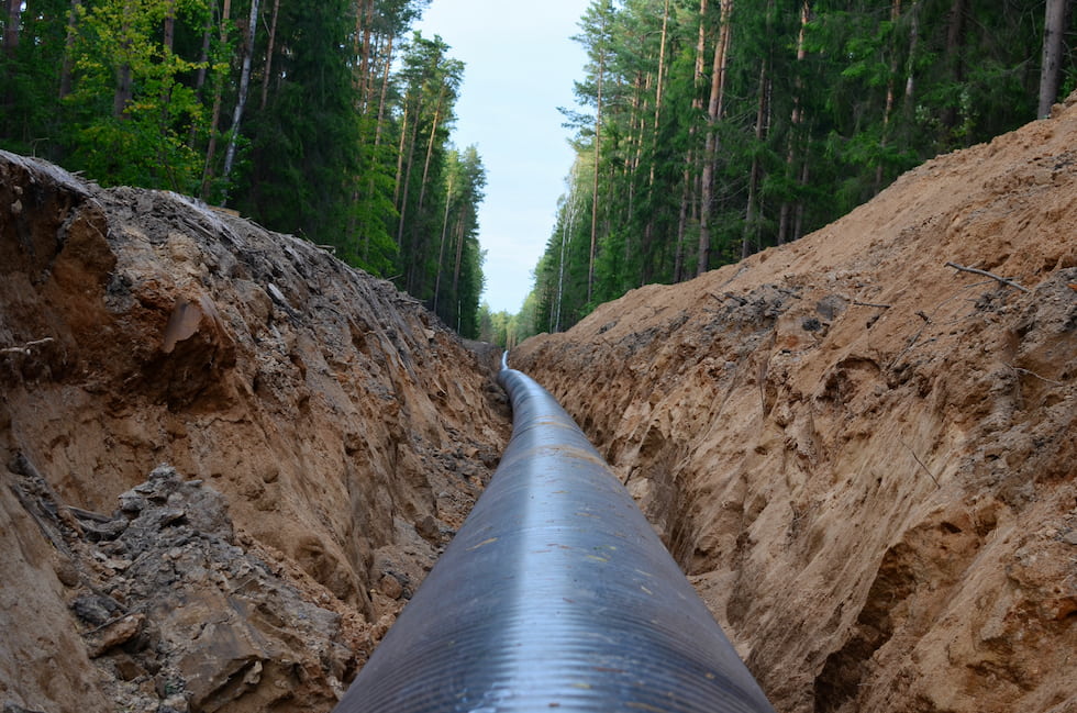 natural gas pipeline going through forest setting